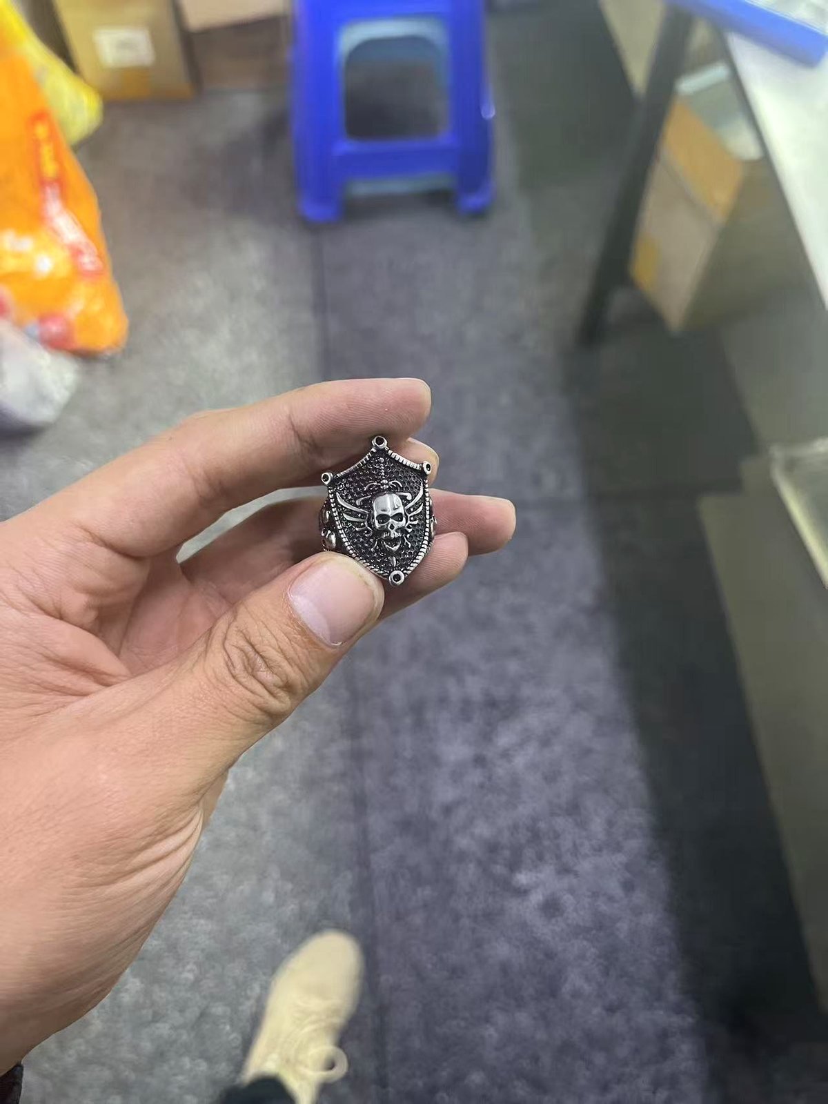 Close-up polished stainless steel jewelry detail for wholesale buyer review
